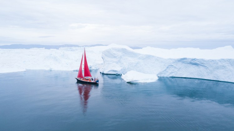 Shooting Stock Photography: Red Sailboat in Ice