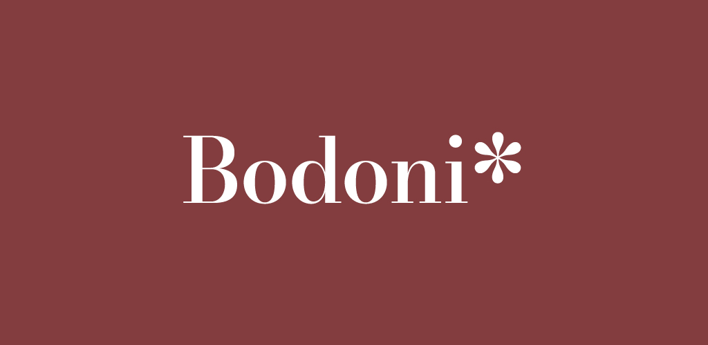 Bodoni* font on marroon background